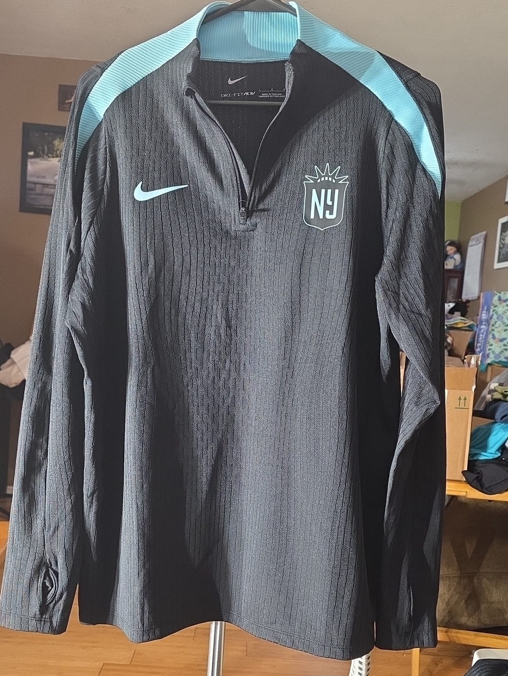 Nike Black Long-Sleeve Training Pullover with Light Blue Accents